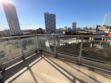 Bright corner unit at The Ivy Condominium featuring