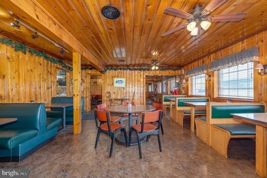 We are excited to present the Lost River Grill and Motel and - photo 15