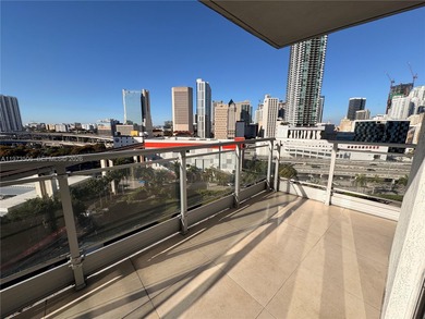 Bright corner unit at The Ivy Condominium featuring