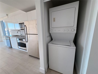 Bright corner unit at The Ivy Condominium featuring