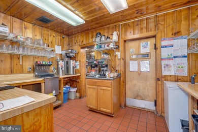 We are excited to present the Lost River Grill and Motel and - photo 19