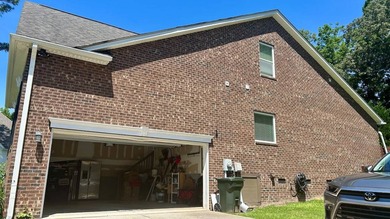 This 4-bedroom, 3-bath brick home is located in Miller Pond in - photo 4