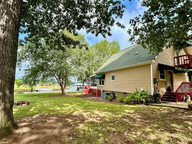 Move In Ready Lakefront Retreat w income potential. - photo 2