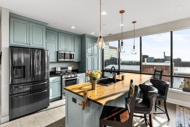 **PRICE IMPROVEMENT**Enjoy the best of Downtown in this