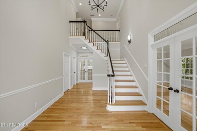 Take a look at this completely remodeled, three-level, all-brick - photo 4