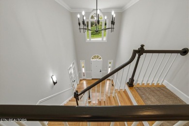 Take a look at this completely remodeled, three-level, all-brick - photo 5
