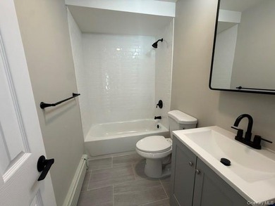 Located in the highly desirable Throgs Neck section of the Bronx - photo 12