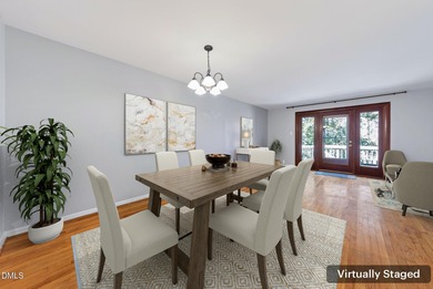 Beautifully updated end-unit townhome offering 3 bedrms & 3 full