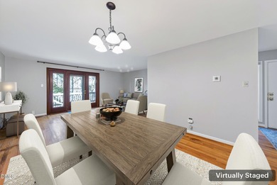 Beautifully updated end-unit townhome offering 3 bedrms & 3 full