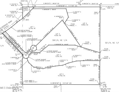 Nestled on 7.57 acres of wooded land overlooking a lake, this - photo 3