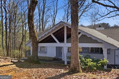 This adorable 4-bedroom, 4.5-bathroom mountain cabin is located - photo 12