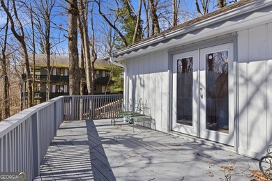 This adorable 4-bedroom, 4.5-bathroom mountain cabin is located - photo 27