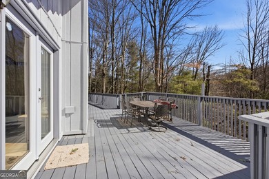 This adorable 4-bedroom, 4.5-bathroom mountain cabin is located - photo 28