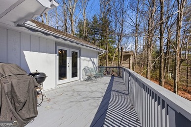 This adorable 4-bedroom, 4.5-bathroom mountain cabin is located - photo 29