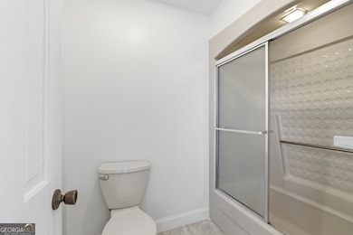 This adorable 4-bedroom, 4.5-bathroom mountain cabin is located - photo 35