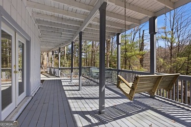 This adorable 4-bedroom, 4.5-bathroom mountain cabin is located - photo 49