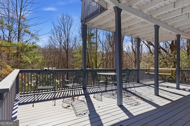 This adorable 4-bedroom, 4.5-bathroom mountain cabin is located - photo 50