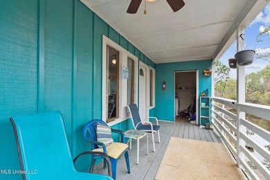 This beautiful cottage offers versatile living with a covered - photo 3