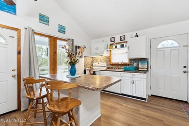 This beautiful cottage offers versatile living with a covered - photo 5