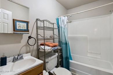 This beautiful cottage offers versatile living with a covered - photo 9