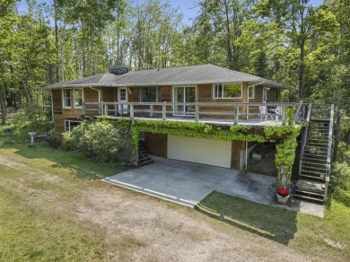 (private lake, pond, creek) Home For Sale in Millersburg Michigan