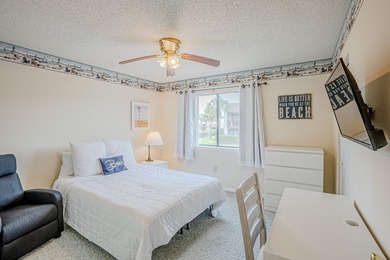 Tucked away in the highly sought after West End of PCB, this - photo 35
