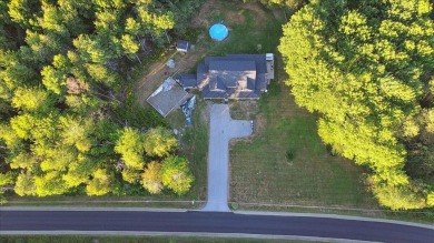 Welcome to this stunning 2022 custom-built home, offering 5