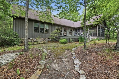 This 3,030-square-foot, 4-bedroom, 4-bathroom lake house with - photo 7
