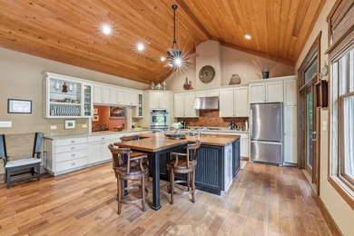 This 3,030-square-foot, 4-bedroom, 4-bathroom lake house with - photo 8