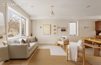 A rare Red Hook townhouse offering two separate residences on - photo 1