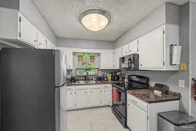 This 3-bedroom, 2-bathroom brick home offers 1,092 square feet - photo 11
