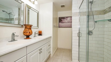 Welcome to this impeccably remodeled 1 Bed, 1.5 Bath Ocean Front