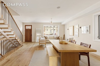 A rare Red Hook townhouse offering two separate residences on - photo 2
