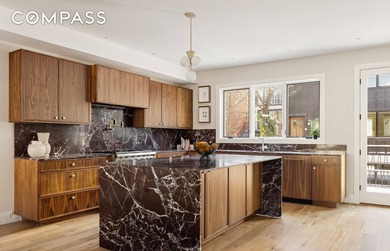 A rare Red Hook townhouse offering two separate residences on - photo 4