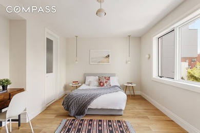 A rare Red Hook townhouse offering two separate residences on - photo 7
