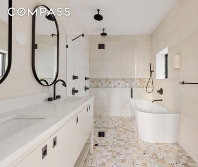 A rare Red Hook townhouse offering two separate residences on - photo 8