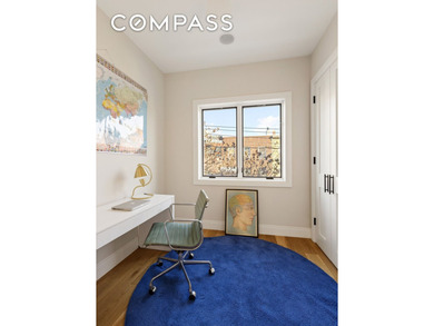 A rare Red Hook townhouse offering two separate residences on - photo 9