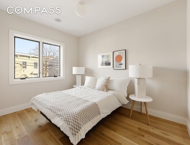 A rare Red Hook townhouse offering two separate residences on - photo 10