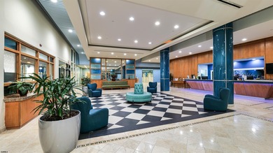 Welcome to this impeccably remodeled 1 Bed, 1.5 Bath Ocean Front