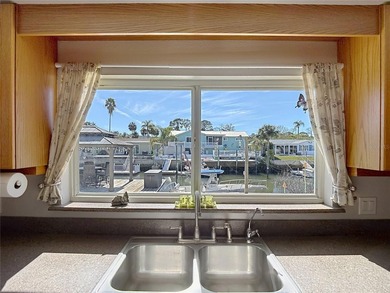MOTIVATED SELLER - Must see beautiful waterfront home with large