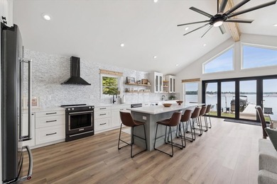 Brand new, turn-key luxury on Portage Lake. Wake up to - photo 17