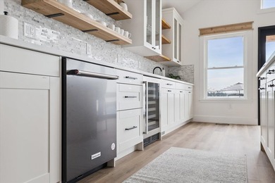 Brand new, turn-key luxury on Portage Lake. Wake up to - photo 19