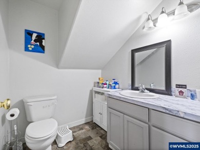 Charming 4-bedroom, 3-bath, two-story home set back from the