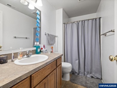 Charming 4-bedroom, 3-bath, two-story home set back from the