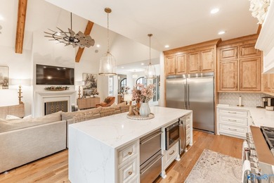 This beautifully designed 4-bedroom home features an open floor - photo 12