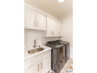 This beautifully designed 4-bedroom home features an open floor - photo 16