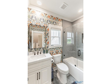 This beautifully designed 4-bedroom home features an open floor - photo 28