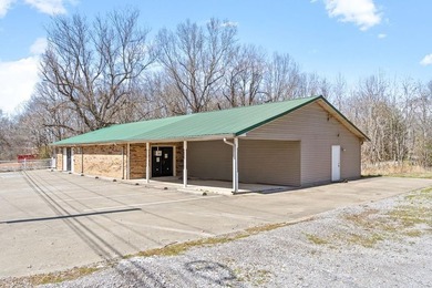 High visibility location on Spring St/Hwy 49, 0.64 acre lot - photo 2