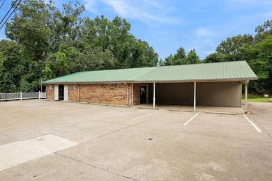 High visibility location on Spring St/Hwy 49, 0.64 acre lot - photo 3