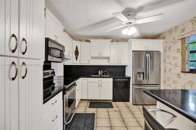 Lake Condo For Sale in Tamarac, Florida